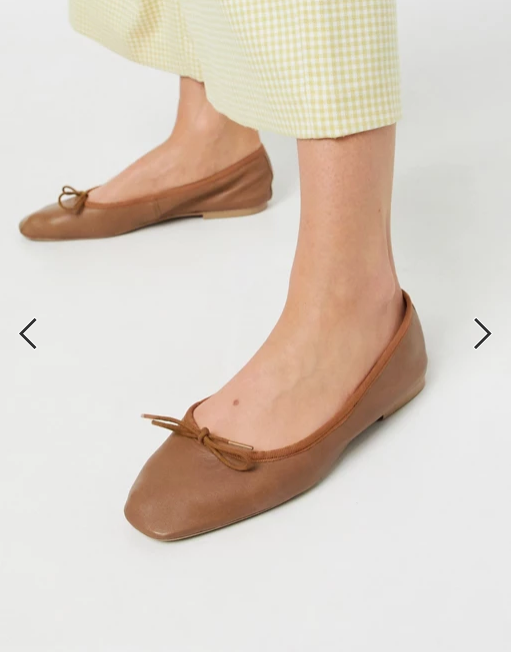 Layer leather bow ballet flats in tan